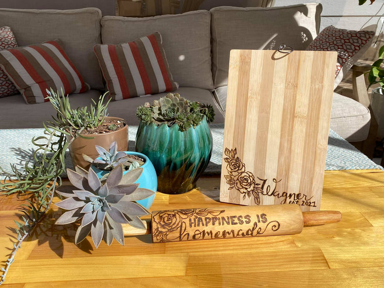 Custom cutting board and rolling pin displayed