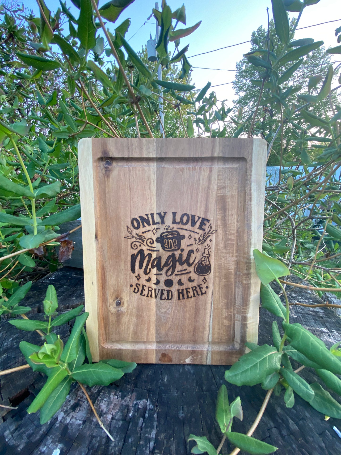 Only Love and Magic cutting board