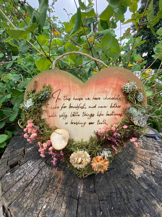 In this House sign
